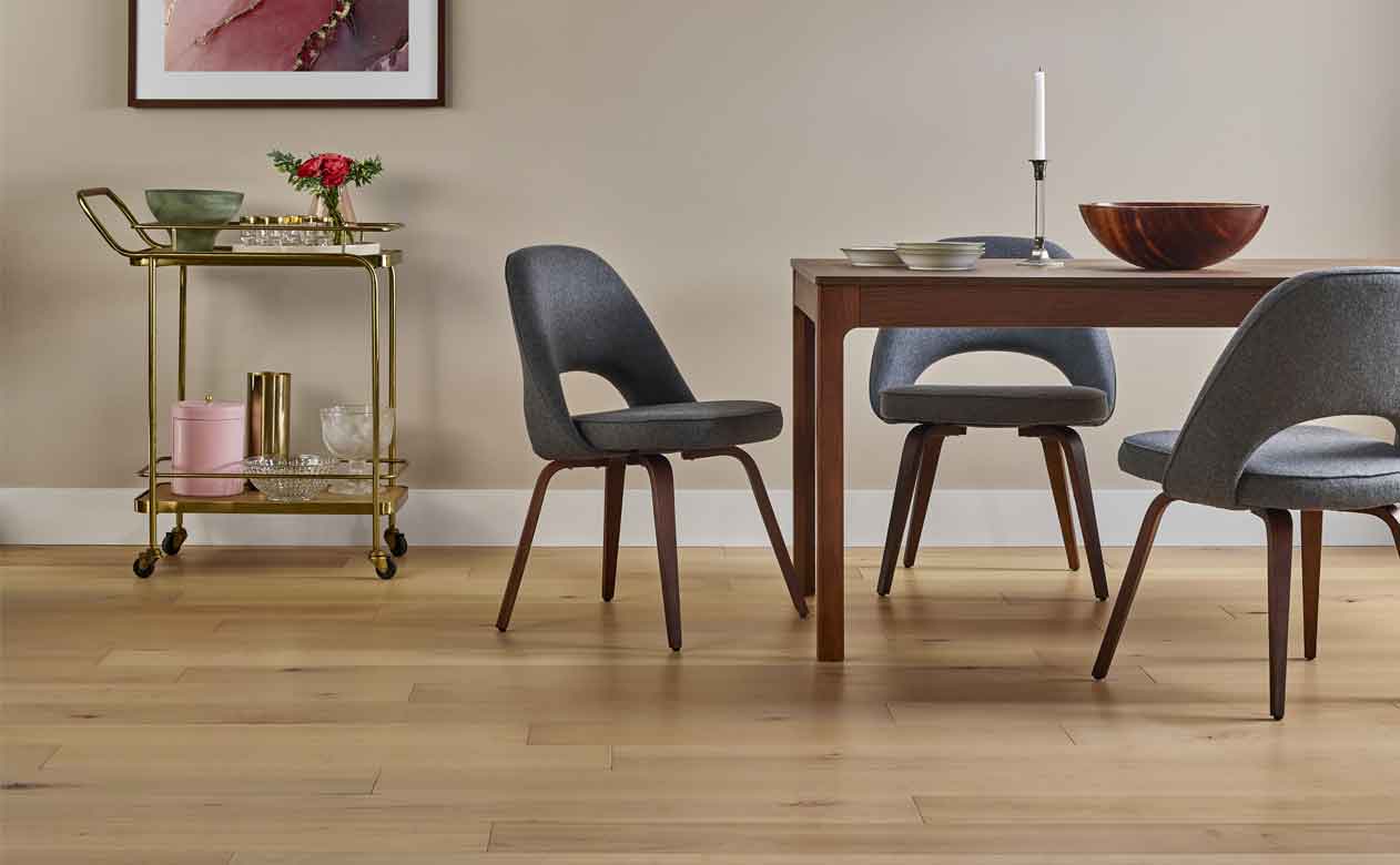 light toned hardwood flooring in midcentury modern dining room