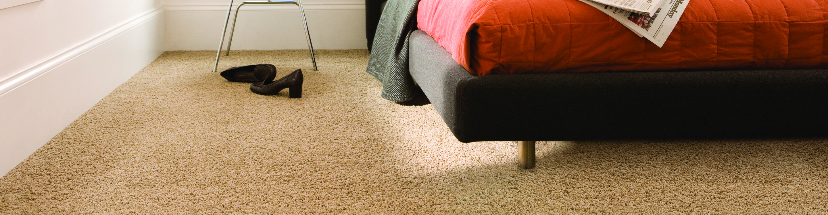 Orange Carpet in Bedroom